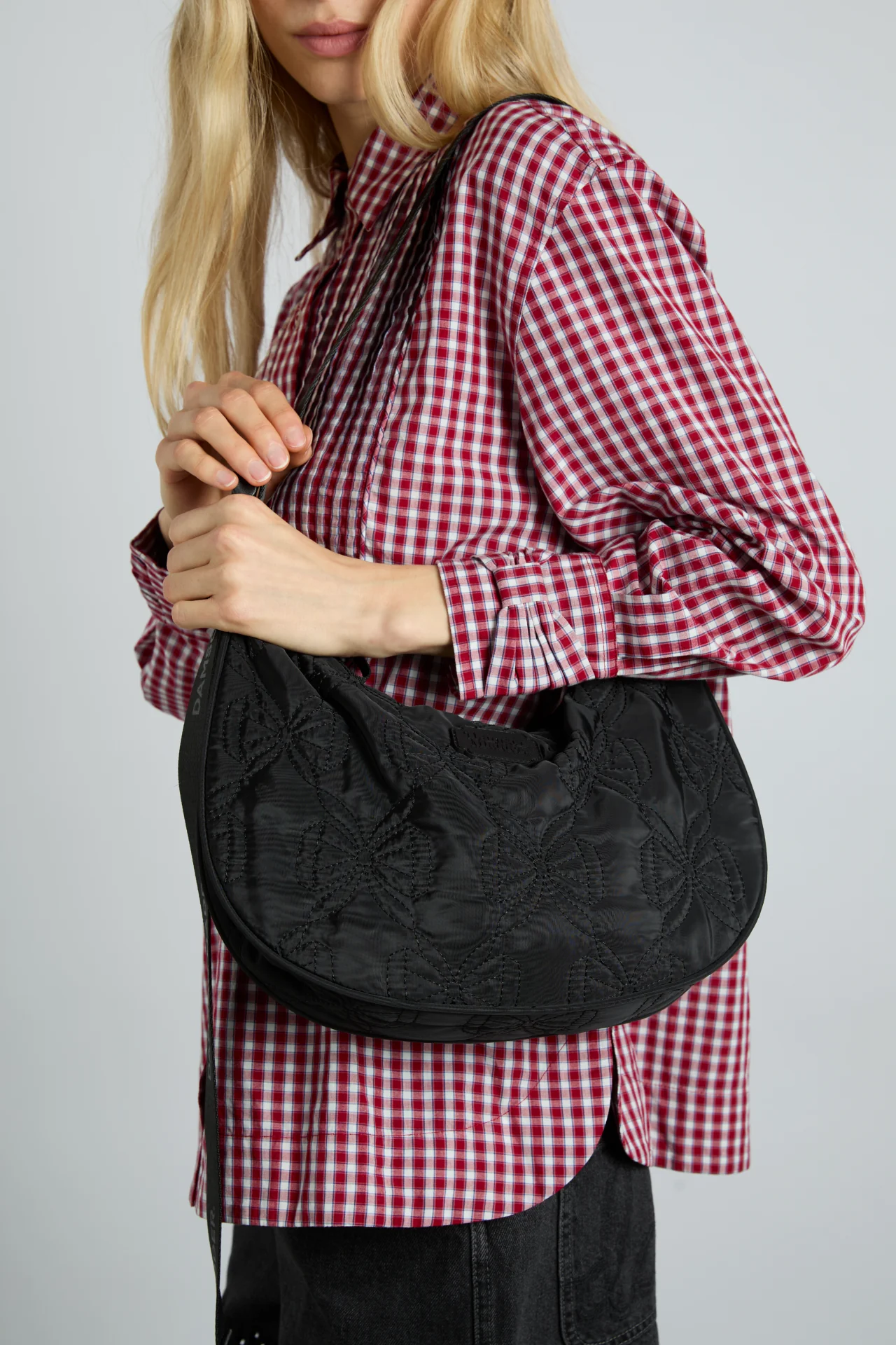 crescent bag with bow stitch detail