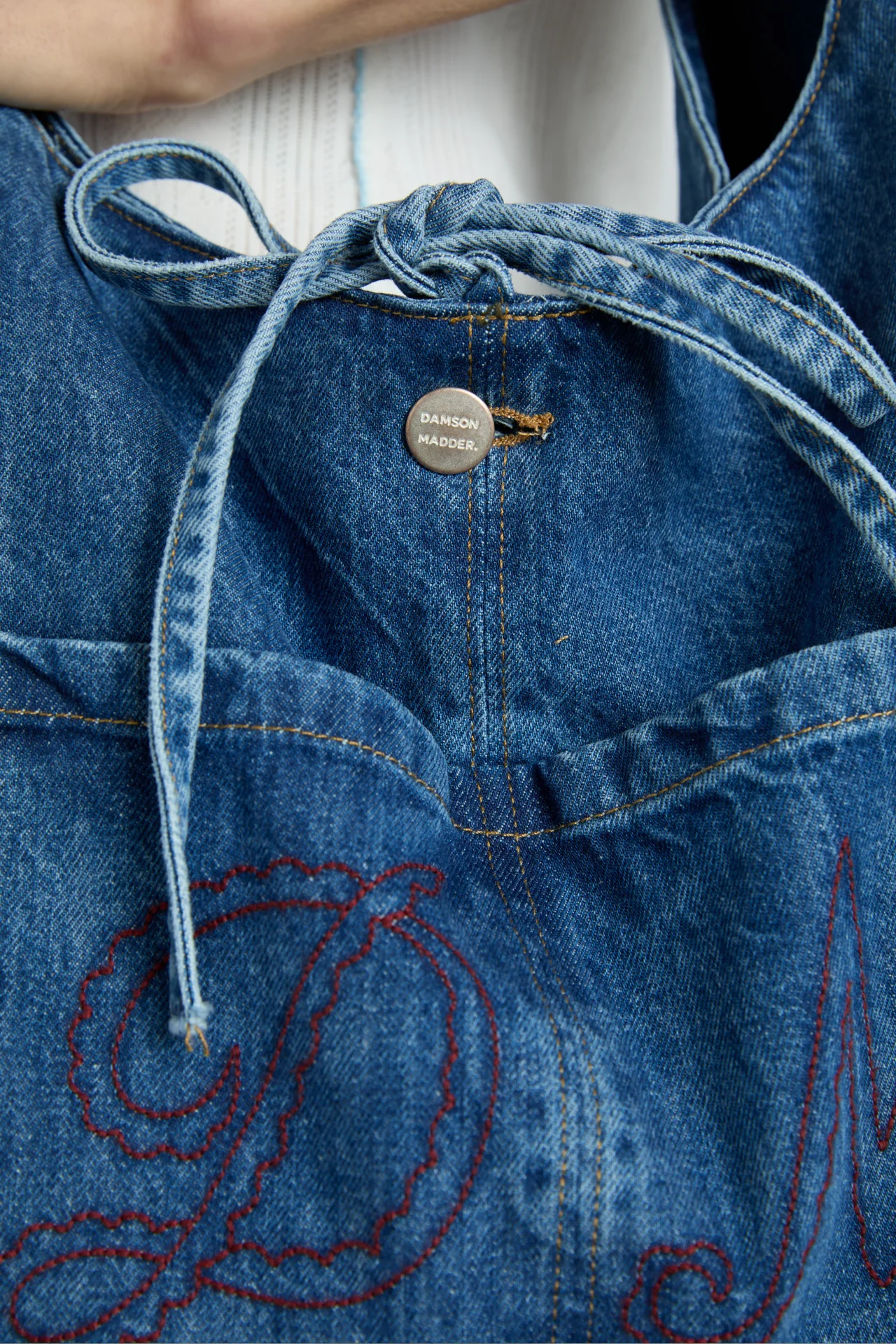 denim sling bag with pocket detail