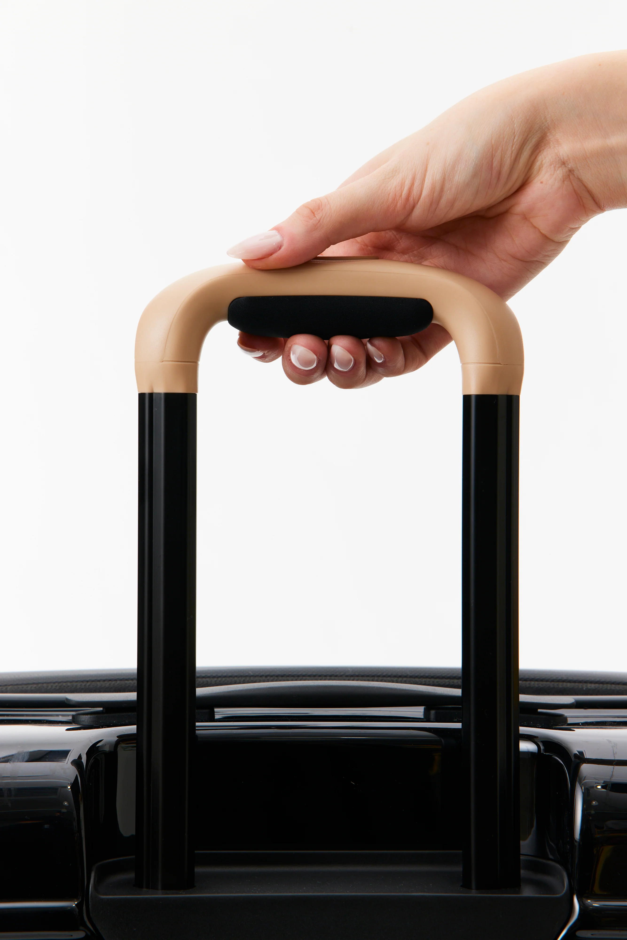 The Large Check-In Roller in Glossy Black