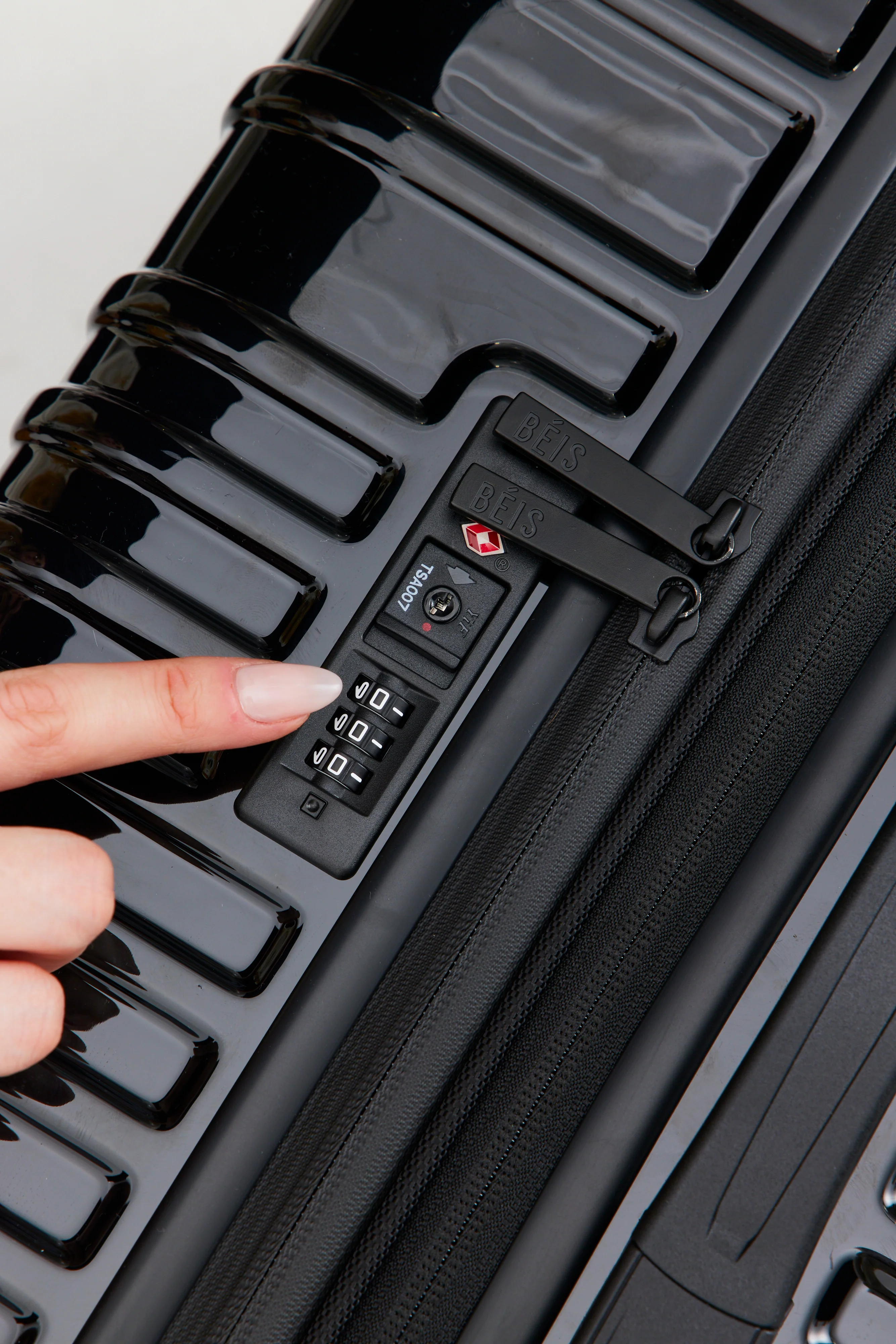 The Large Check-In Roller in Glossy Black