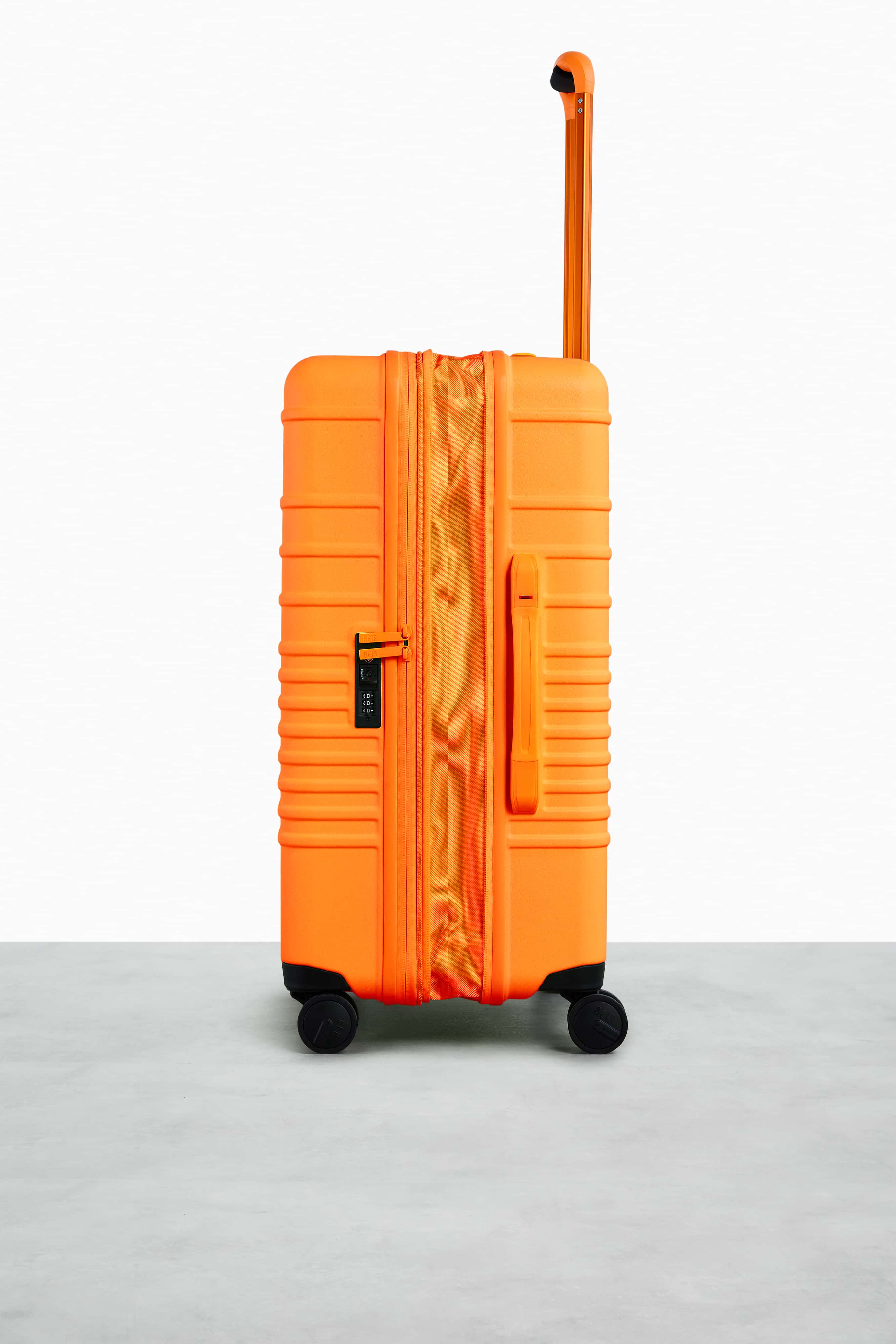The Medium Check-In Roller in Creamsicle