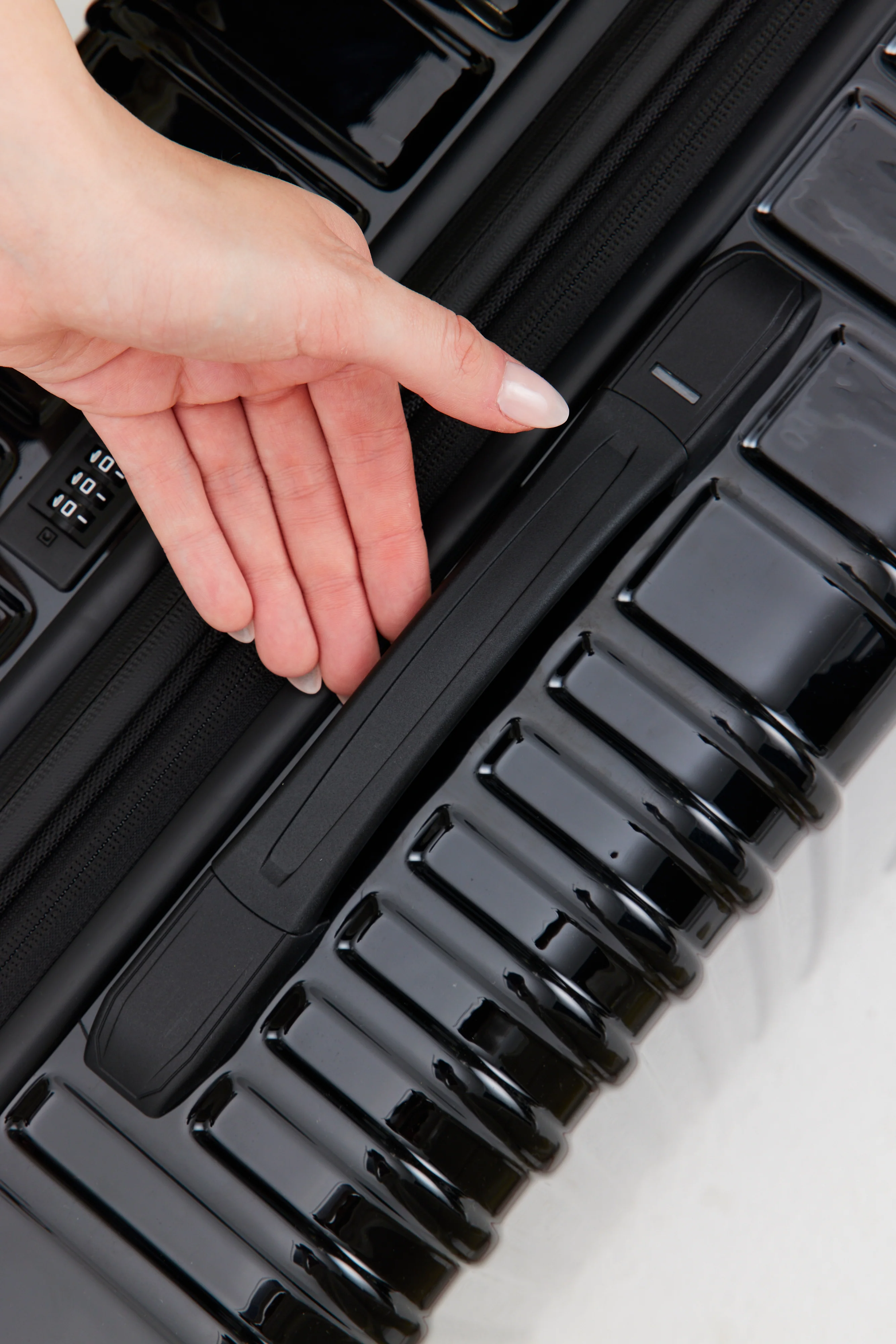 The Carry-On Roller in Glossy Black