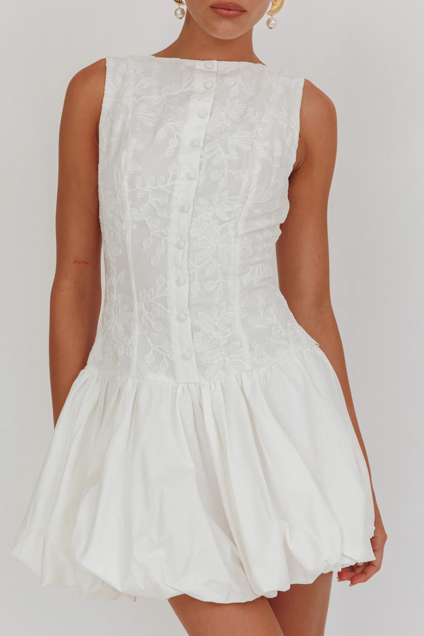 Opulent Sleeveless Bubble Hem Mini Dress Embroidered White