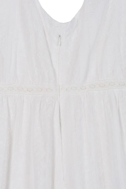 Embroidered white V neckline tiered dress