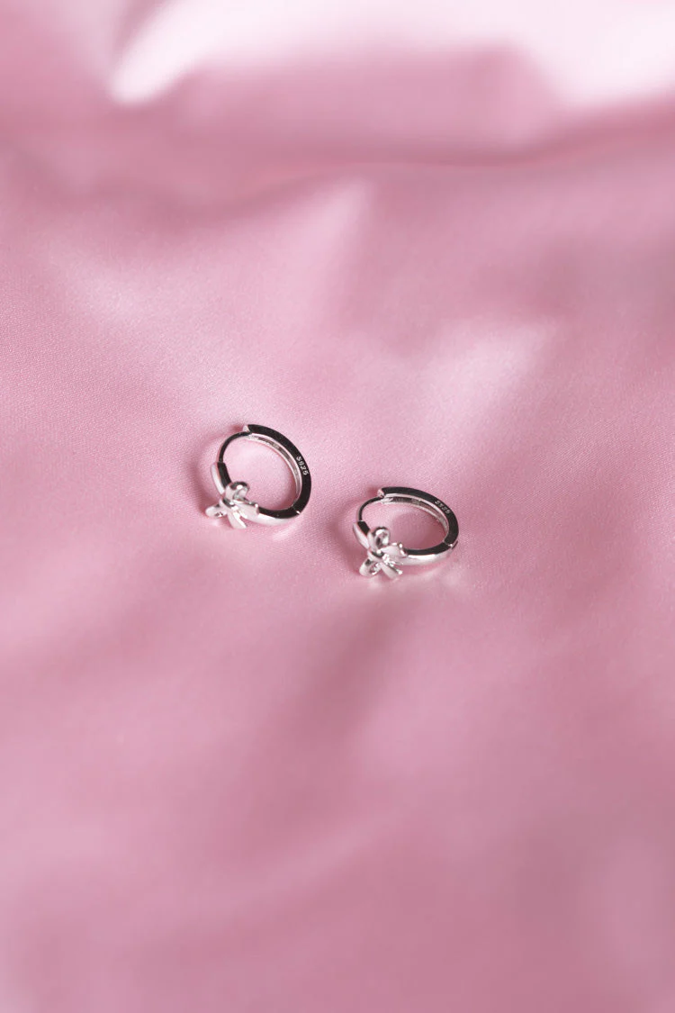 Darling Silver Bow Huggie Earrings