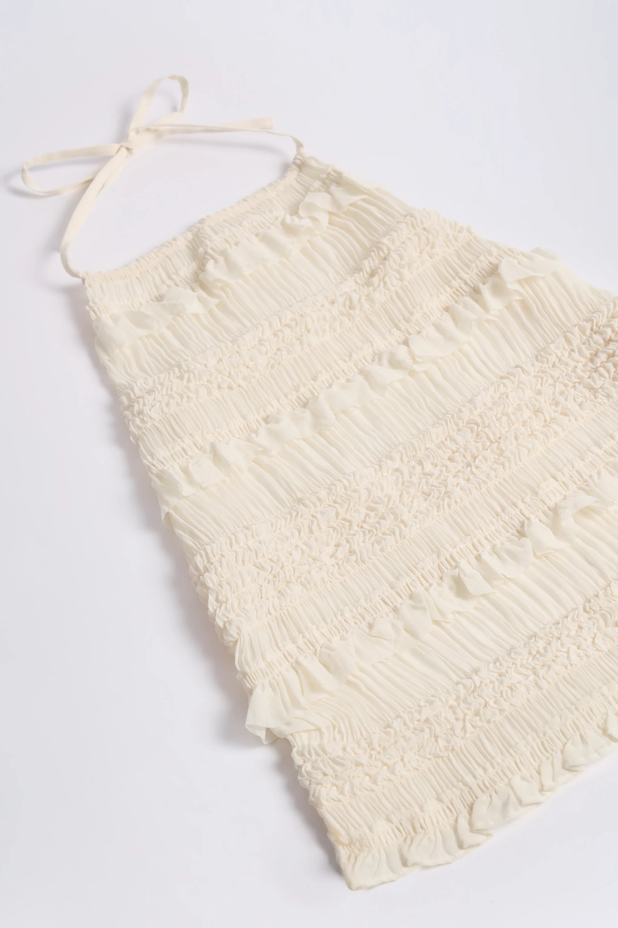 Ruffled High-Neck Backless Top in Ivory