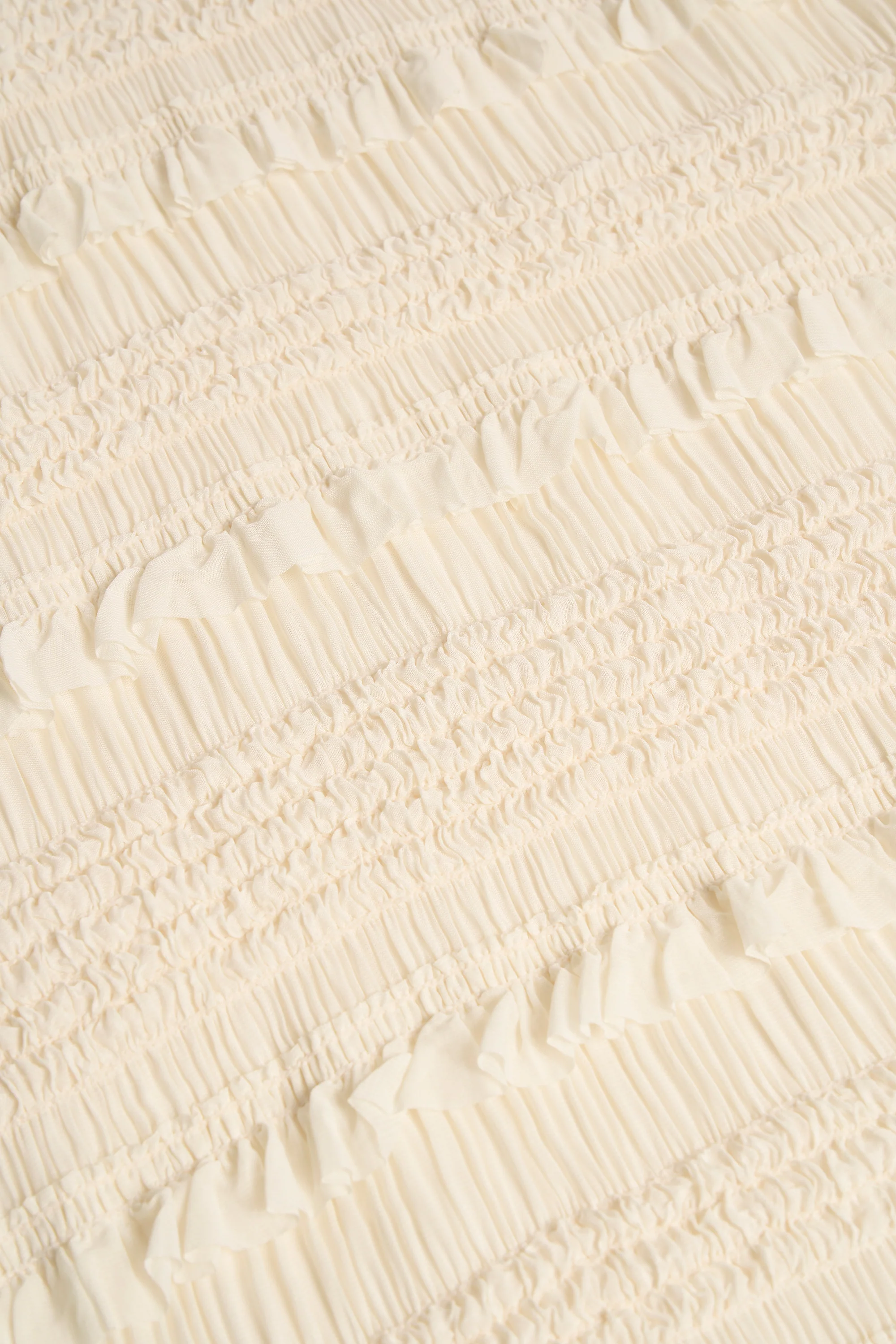 Ruffled High-Neck Backless Top in Ivory