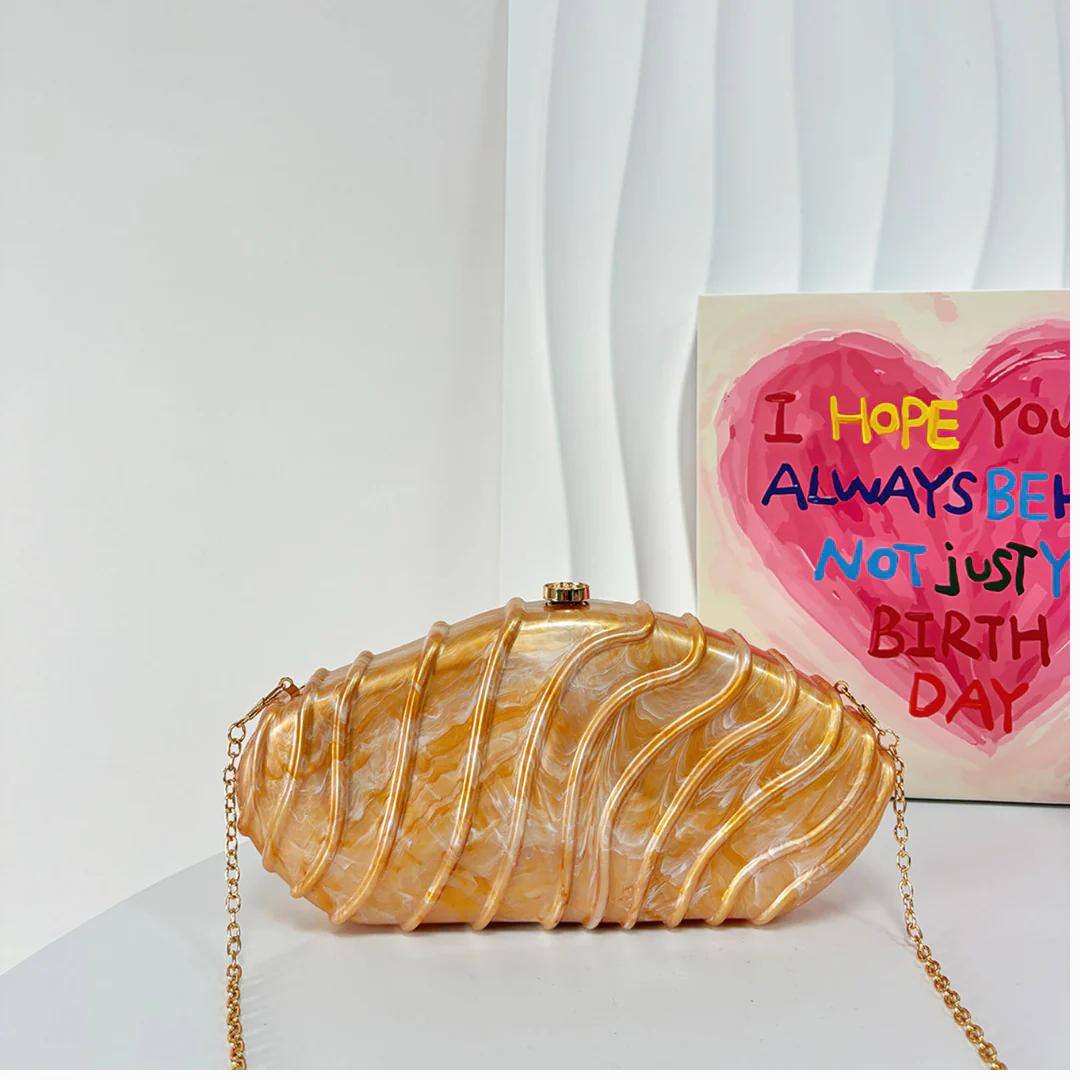 Ravyn Shell Clutch Bag
