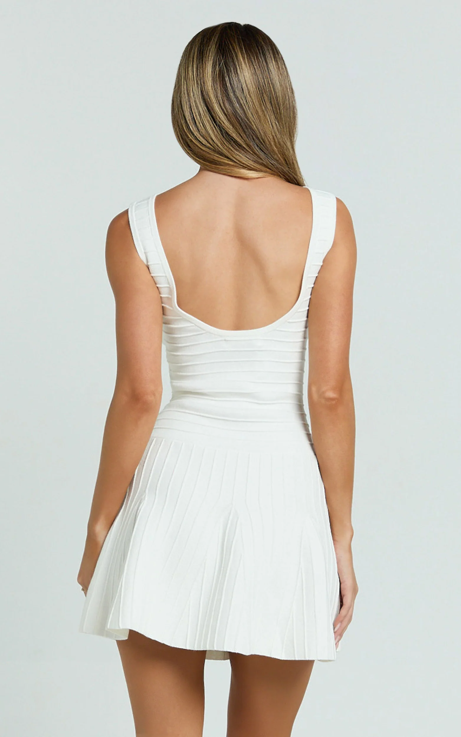 Jacqueline Mini Dress - High Neck Fit And Flare Pleat Knit Dress in Cream