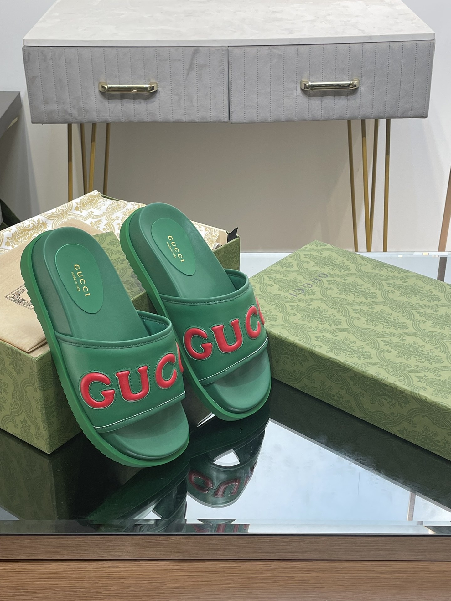 Gucci slippers with large platform logos