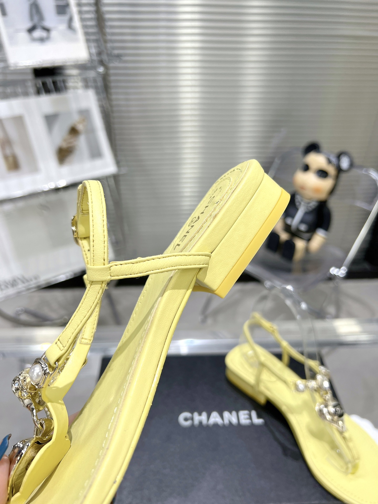 Chanel pearl rhinestone love clasp clip-toe flat sandals.