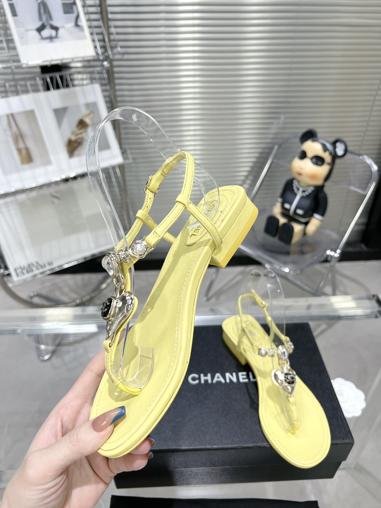 Chanel pearl rhinestone love clasp clip-toe flat sandals.