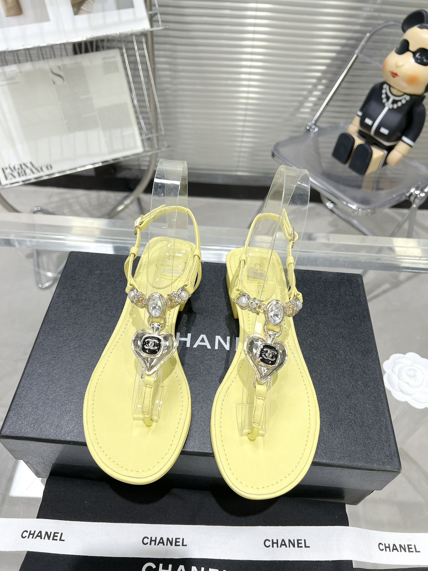 Chanel pearl rhinestone love clasp clip-toe flat sandals.