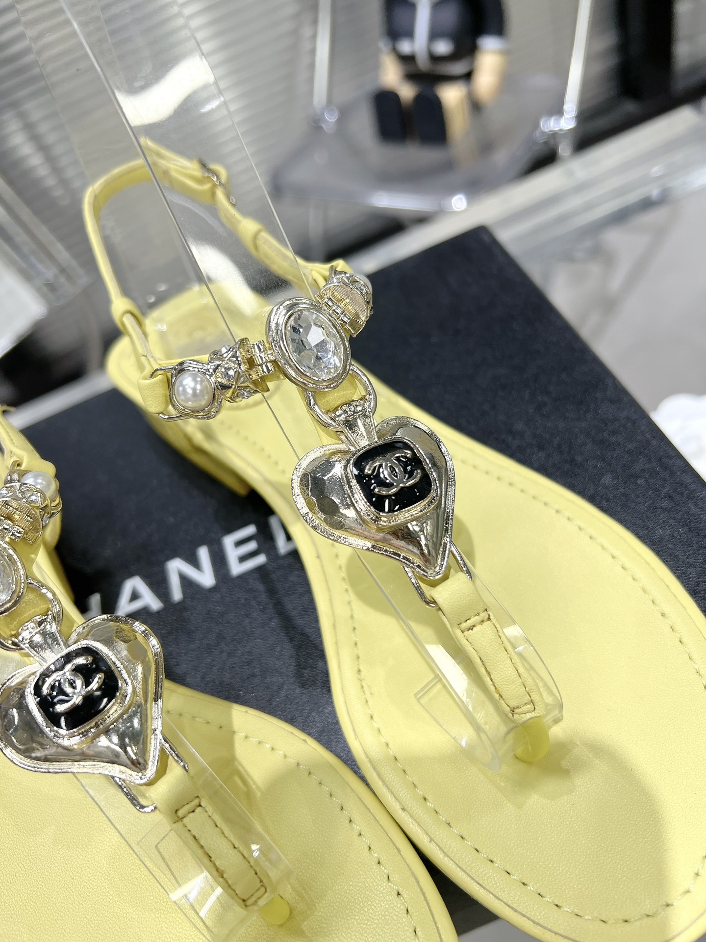Chanel pearl rhinestone love clasp clip-toe flat sandals.