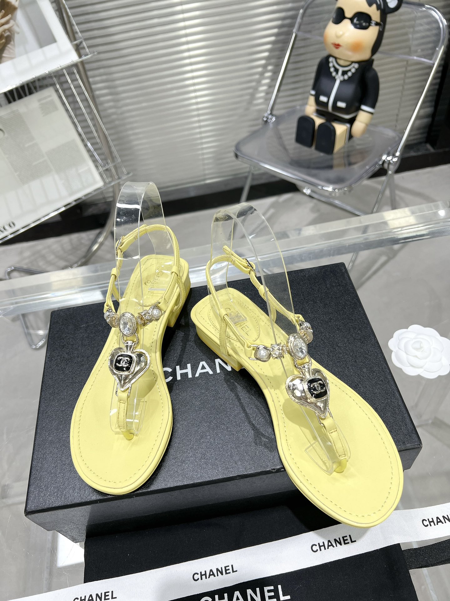 Chanel pearl rhinestone love clasp clip-toe flat sandals.