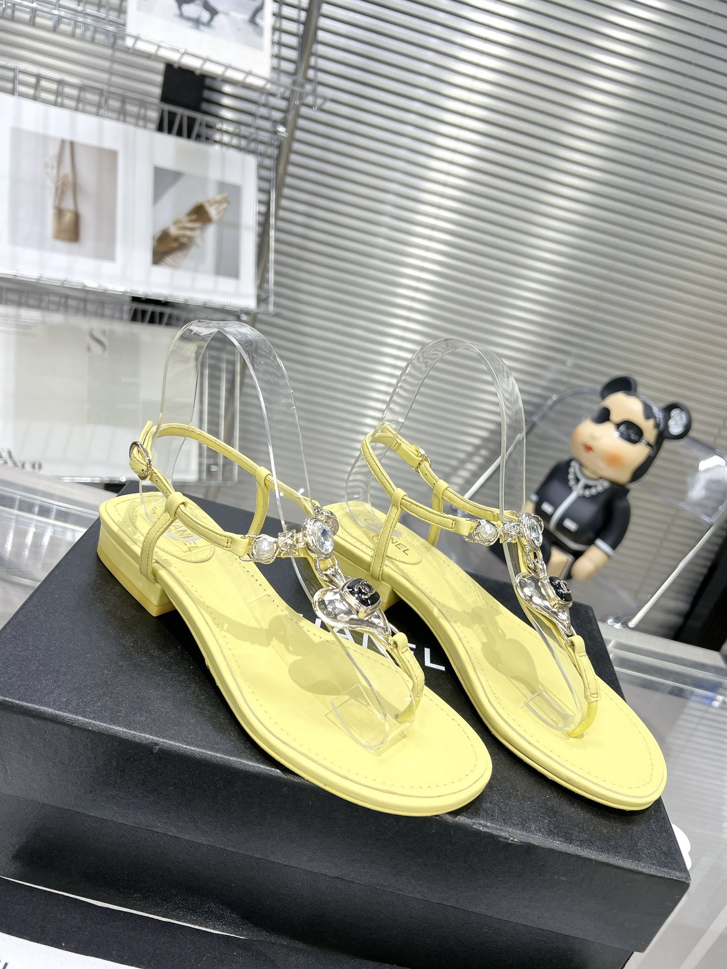 Chanel pearl rhinestone love clasp clip-toe flat sandals.