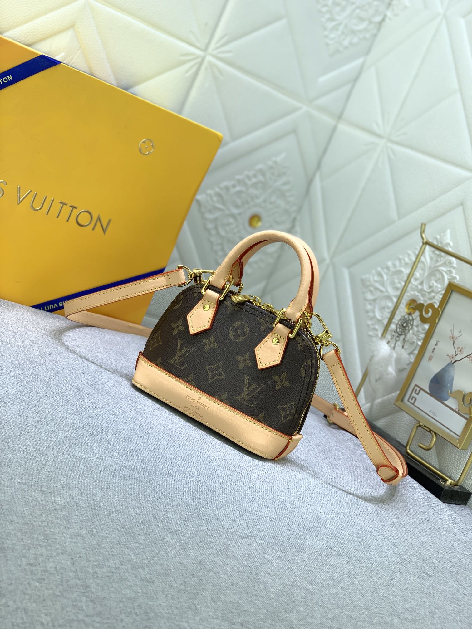 Louis Vuitton LV Alma Nano shell bag