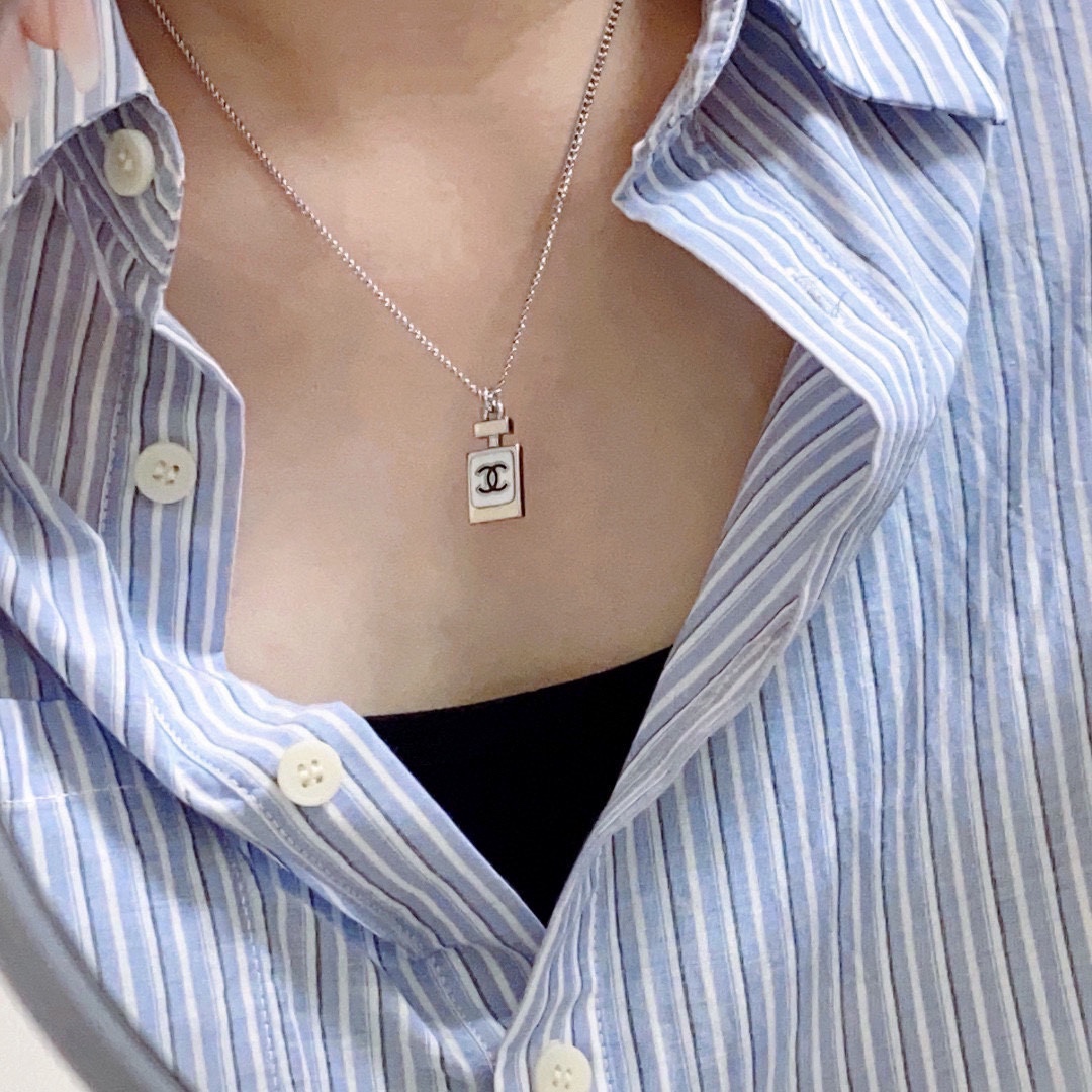 Chanel Double C perfume bottle necklace