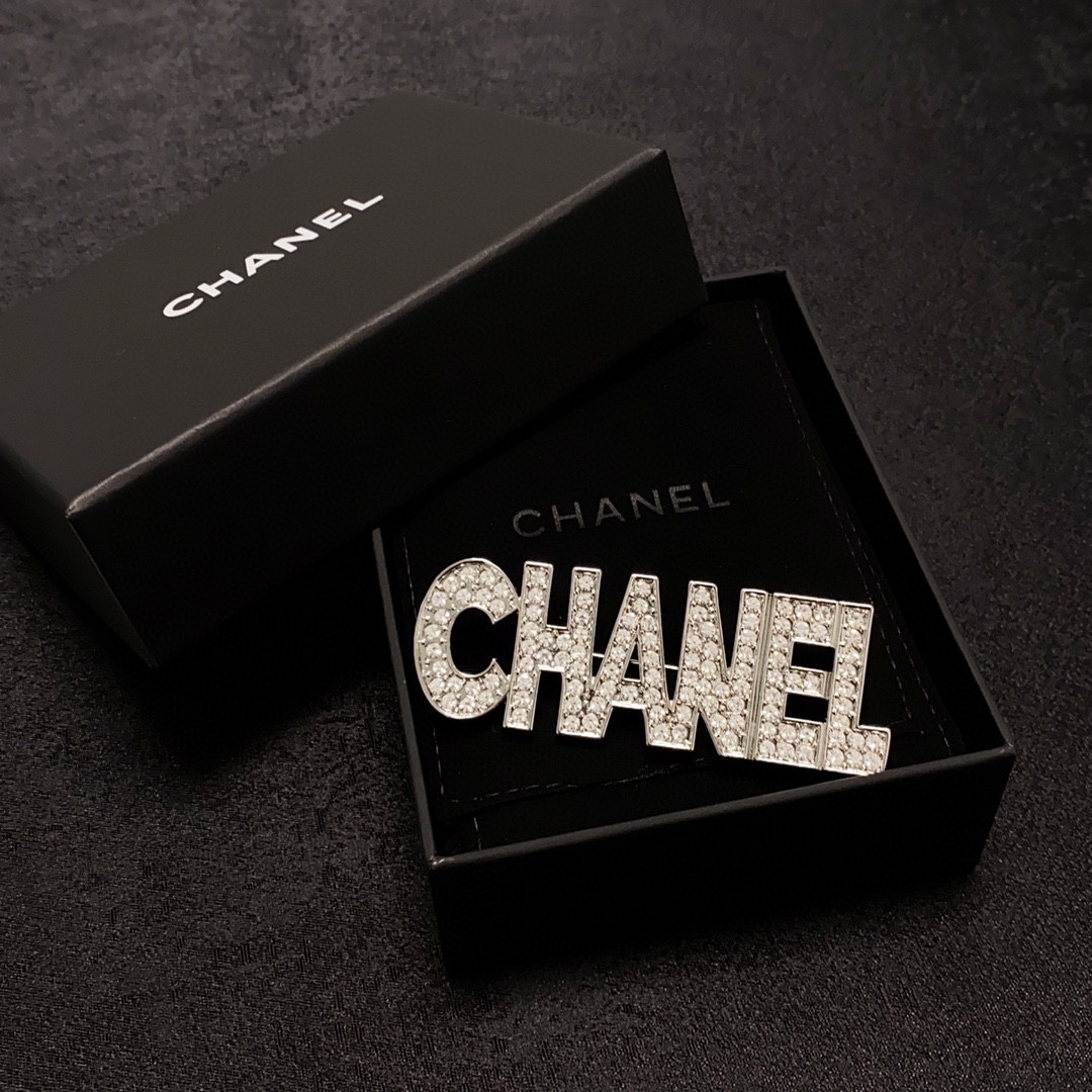 CHANEL lettering all-over diamond Chanel brooch