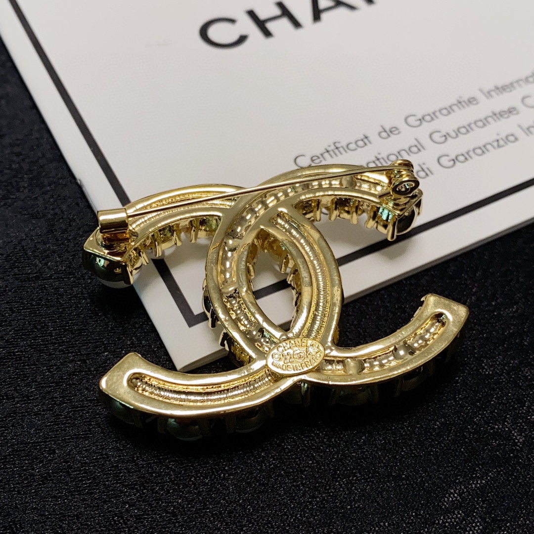 CHANEL lettering all-over diamond Chanel brooch