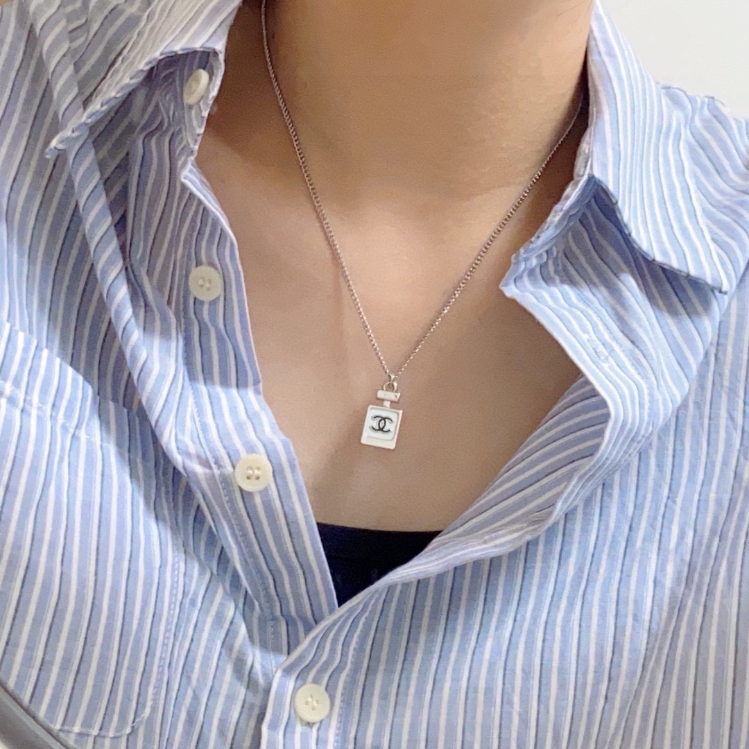 Chanel Double C perfume bottle necklace