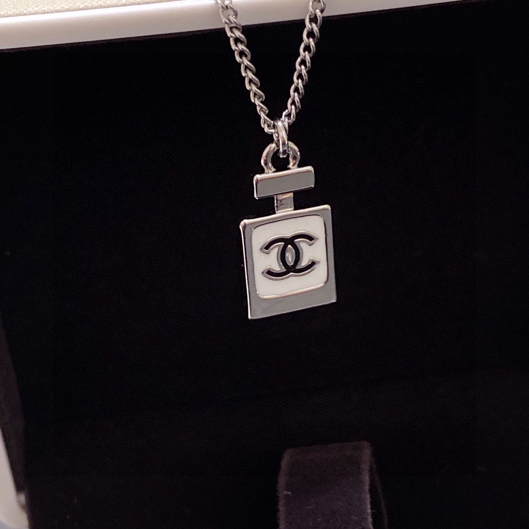 Chanel Double C perfume bottle necklace