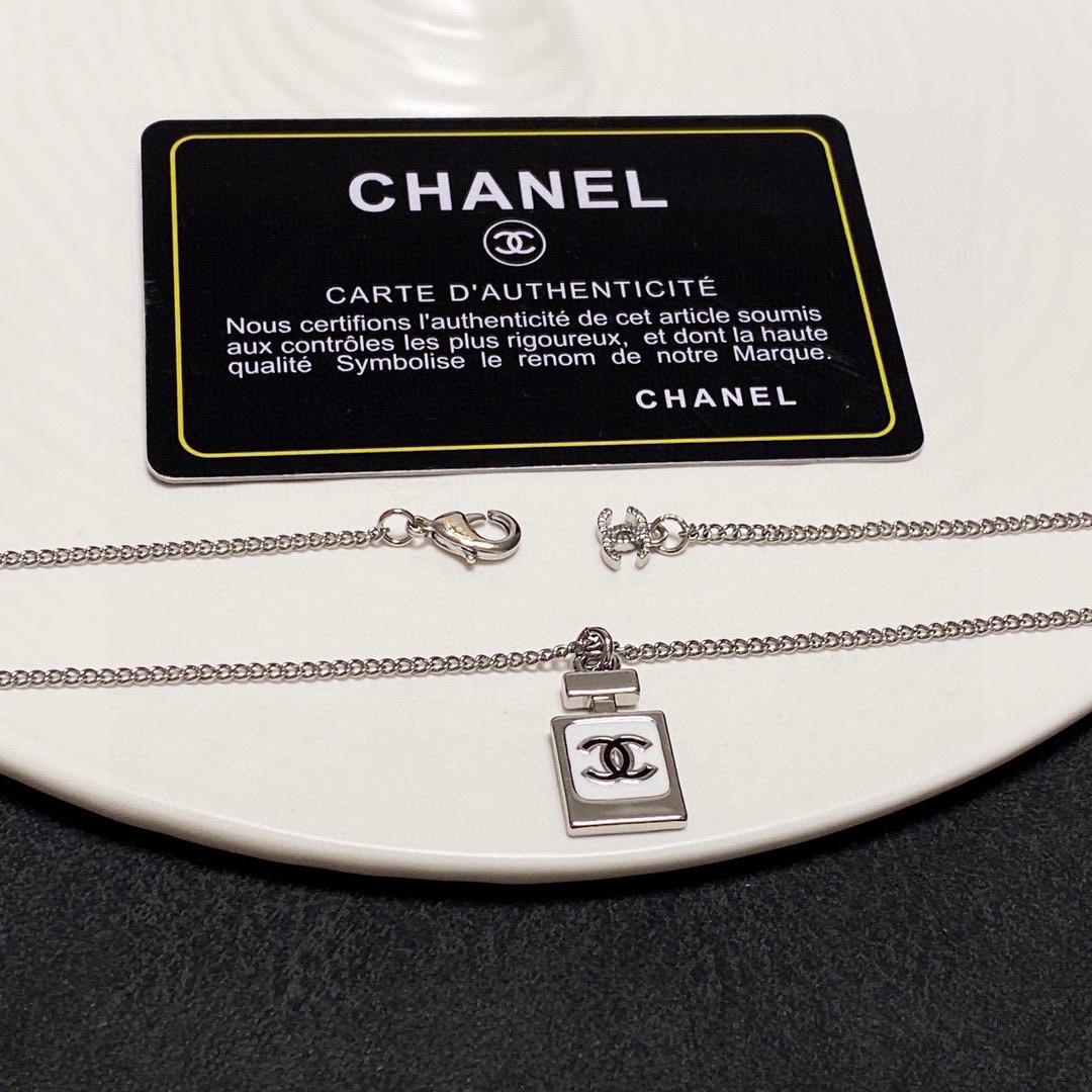 Chanel Double C perfume bottle necklace