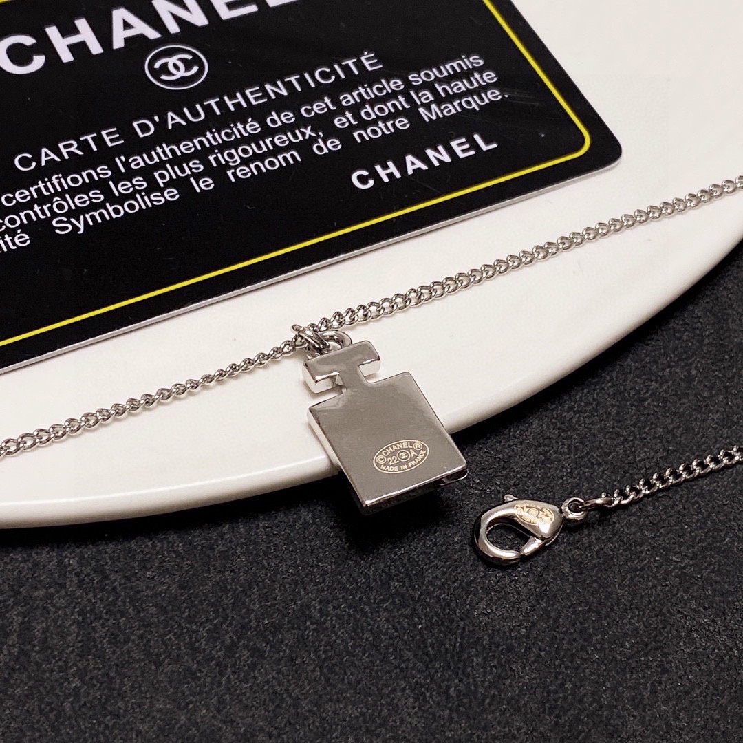 Chanel Double C perfume bottle necklace