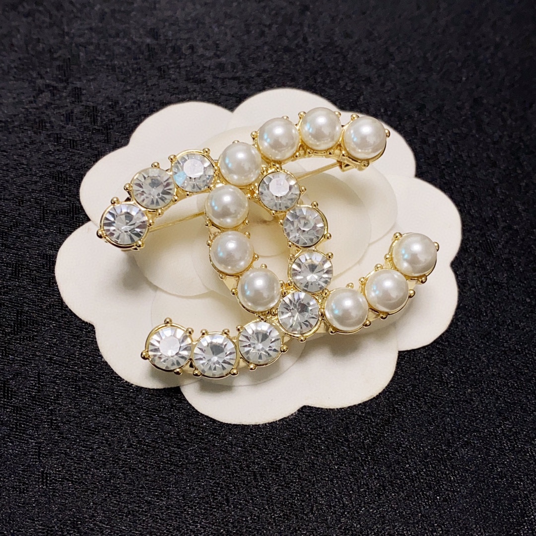 CHANEL lettering all-over diamond Chanel brooch