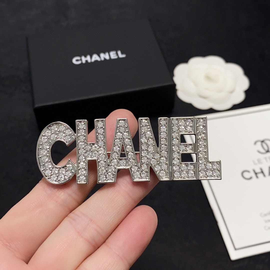 CHANEL lettering all-over diamond Chanel brooch