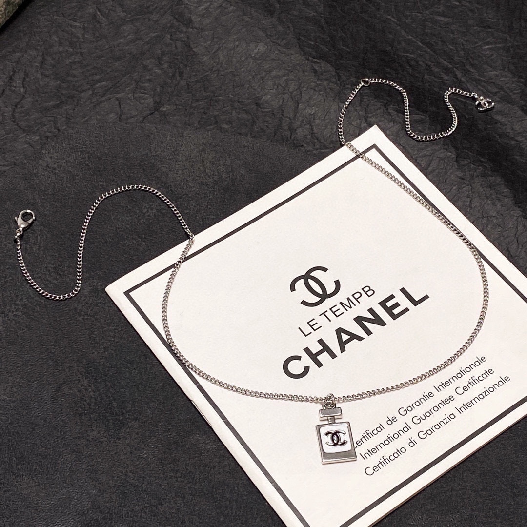 Chanel Double C perfume bottle necklace