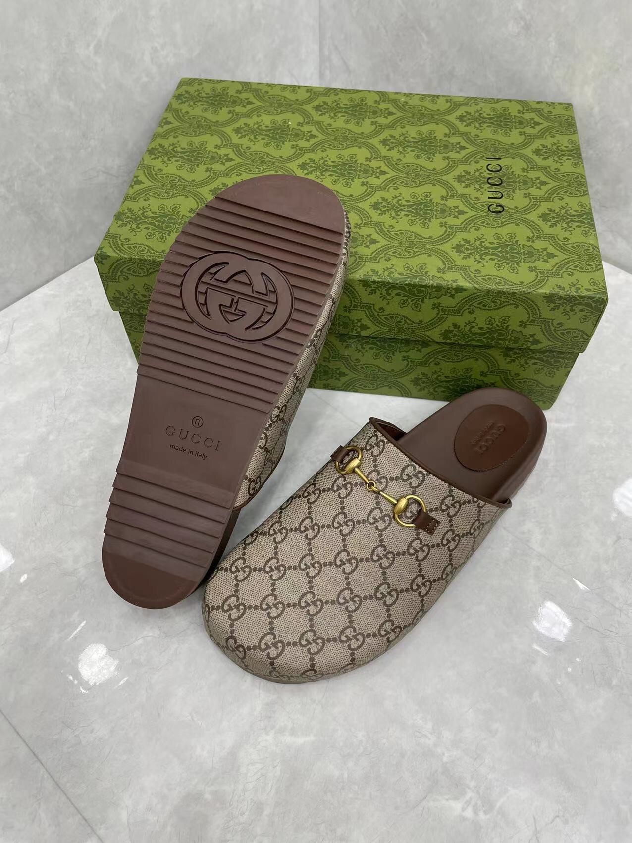Gucci couple's matching slippers, the GG horsebit mules