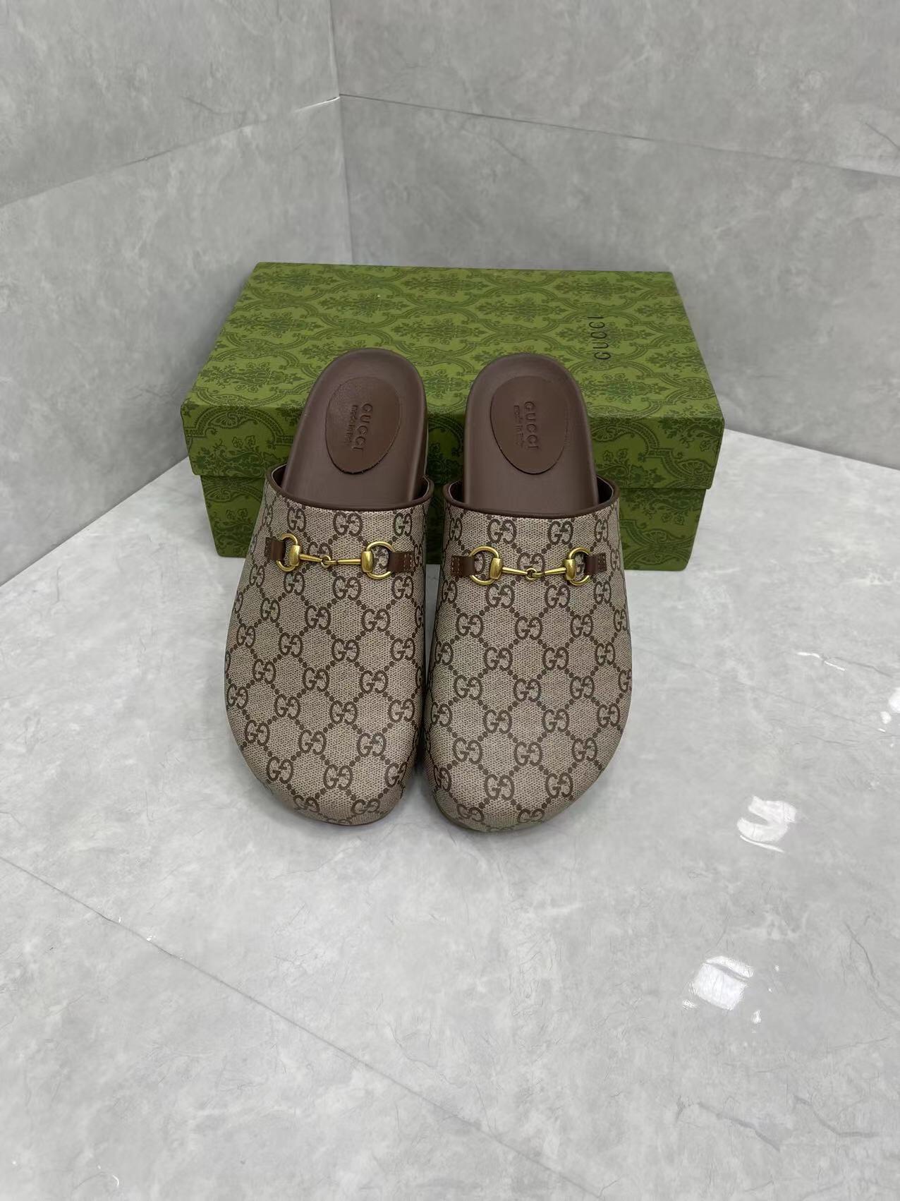 Gucci couple's matching slippers, the GG horsebit mules
