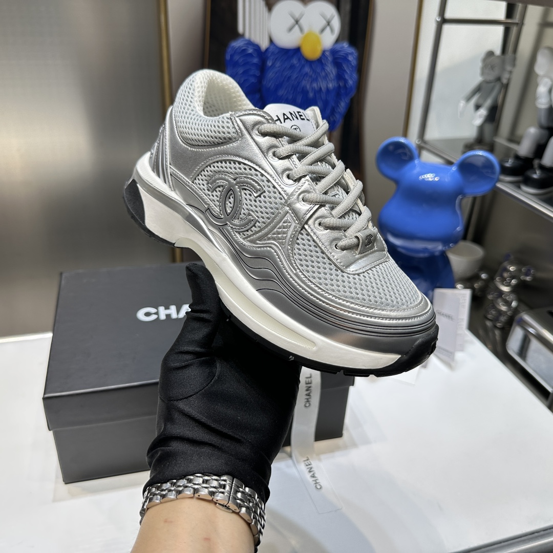 CHANEL Gold and silver horn king sneakers