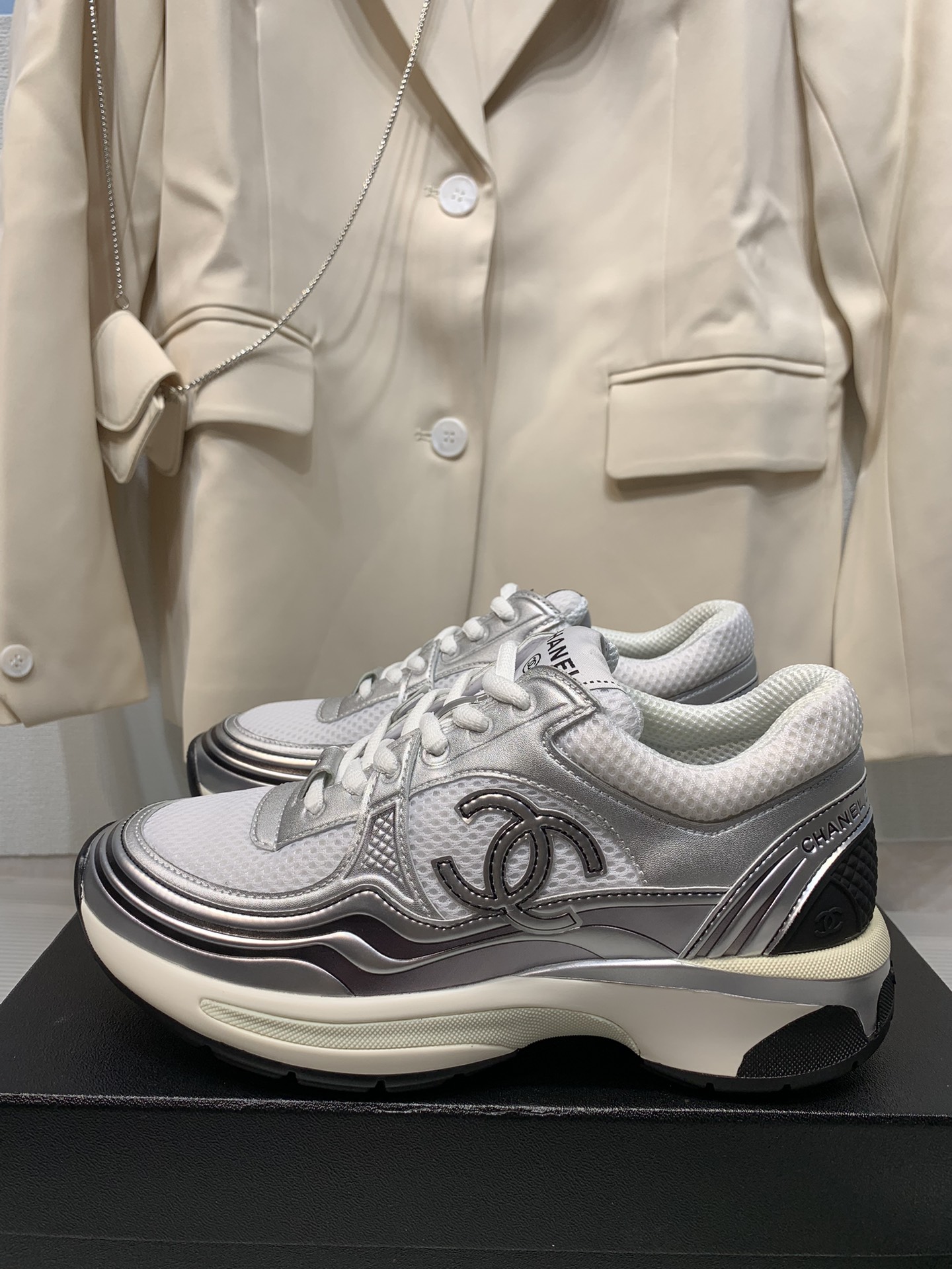 CHANEL Gold and silver horn king sneakers