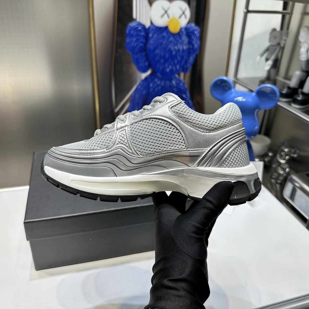 CHANEL Gold and silver horn king sneakers