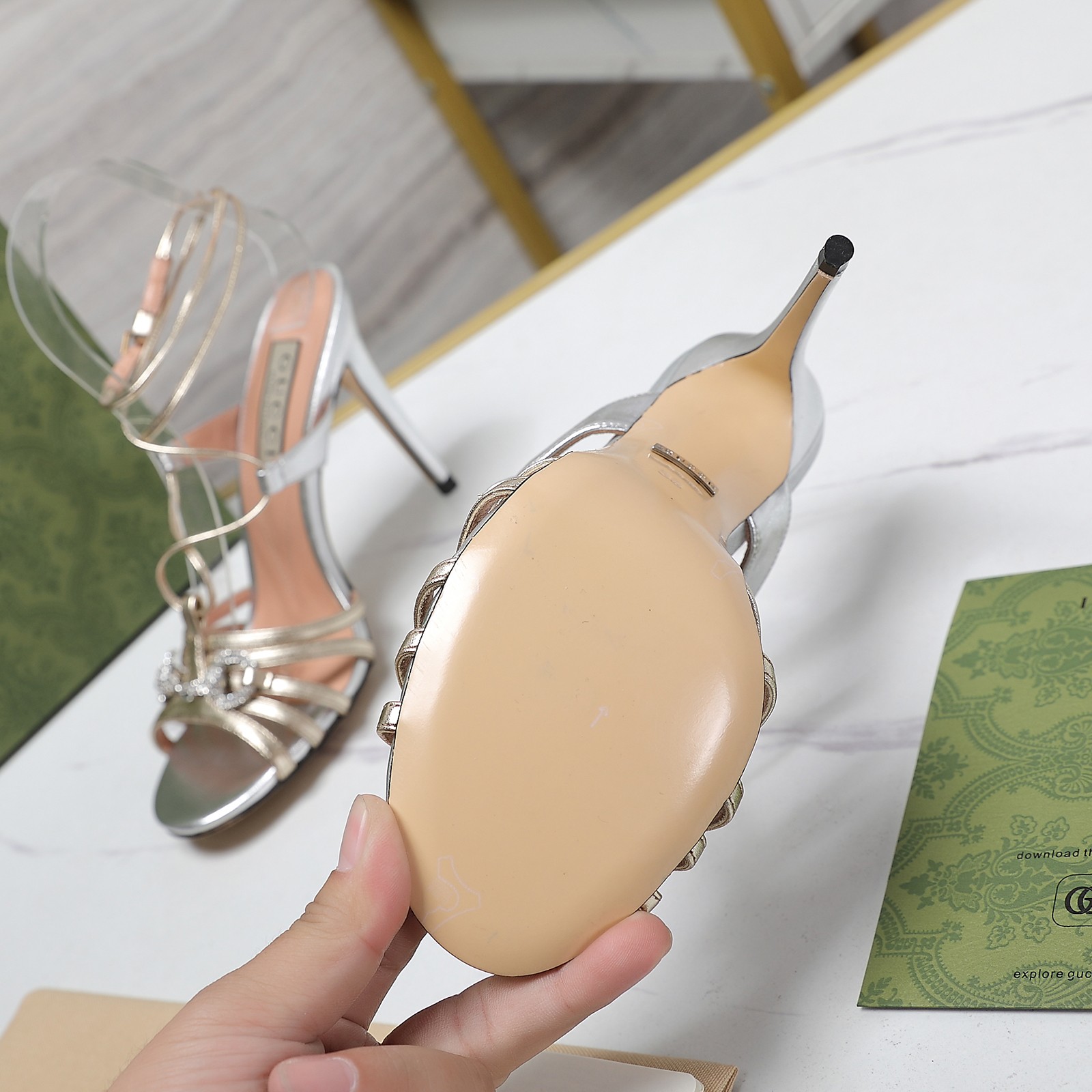 Gucci Double G diamond chain buckle with sandals on the back heel