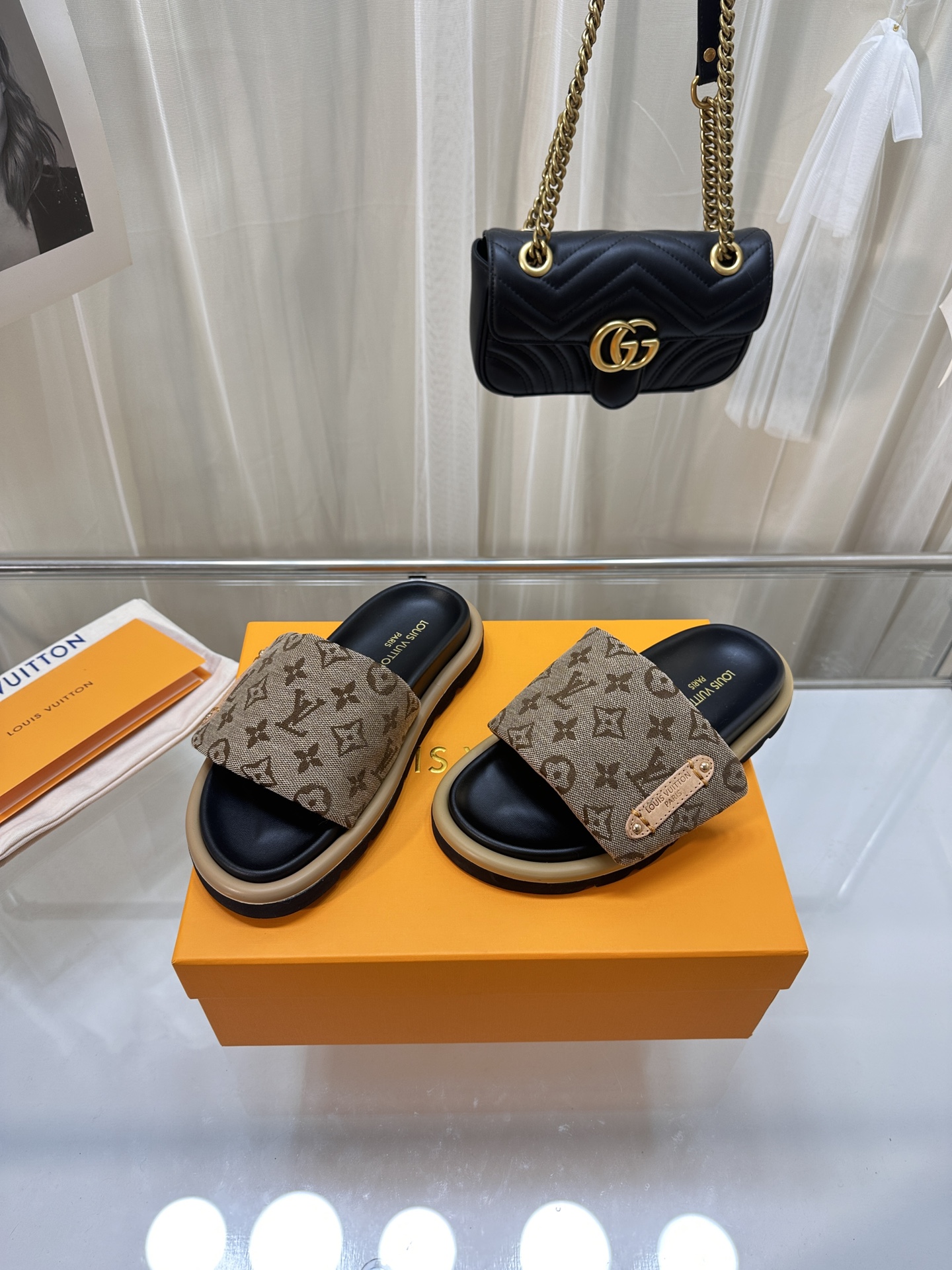 LOUIS VUITTON SLIDES