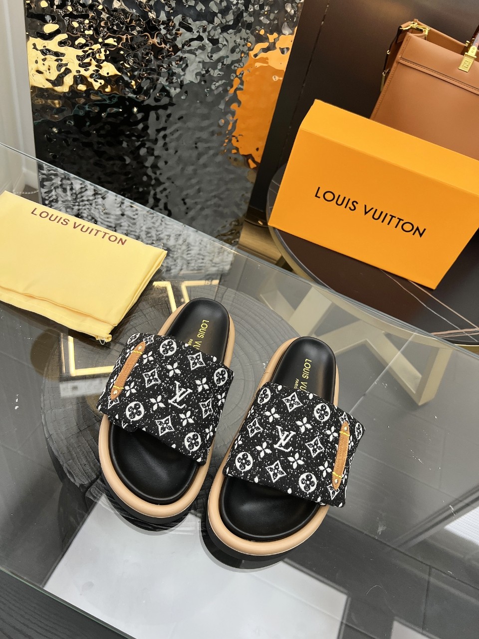 LOUIS VUITTON SLIDES