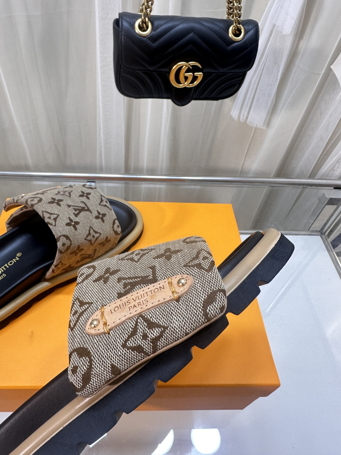 LOUIS VUITTON SLIDES