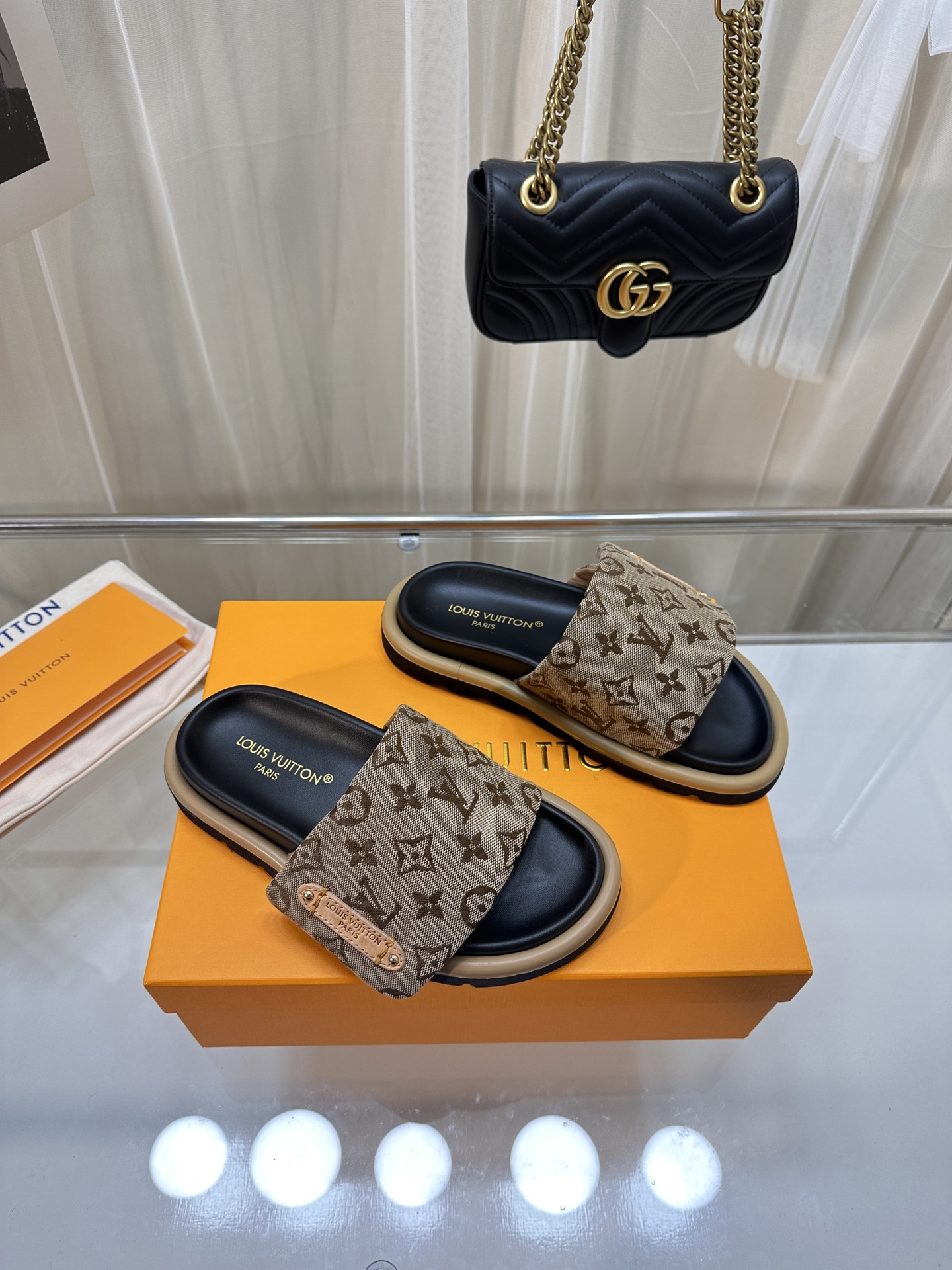 LOUIS VUITTON SLIDES