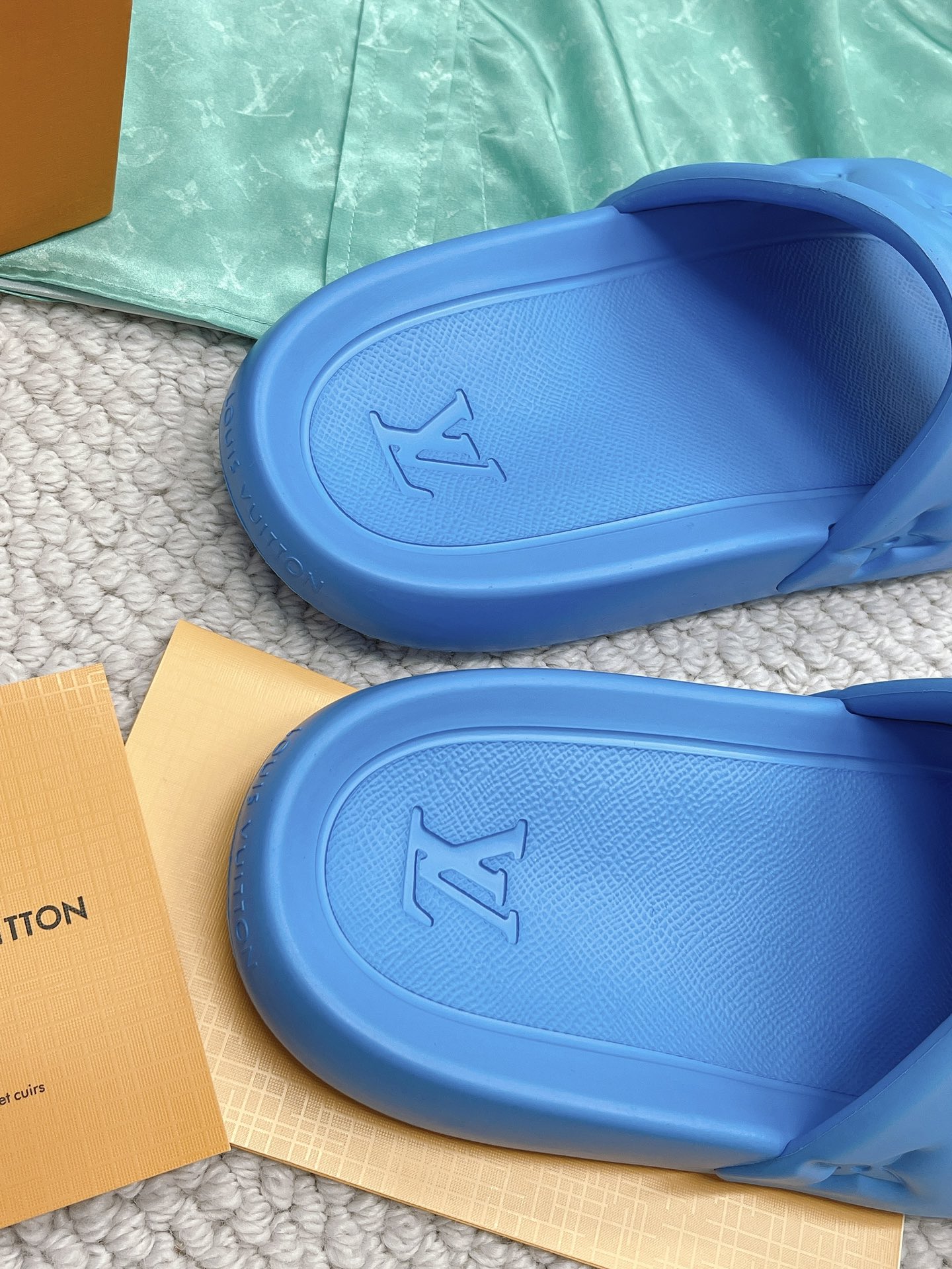 LOUIS VUITTON SLIDES