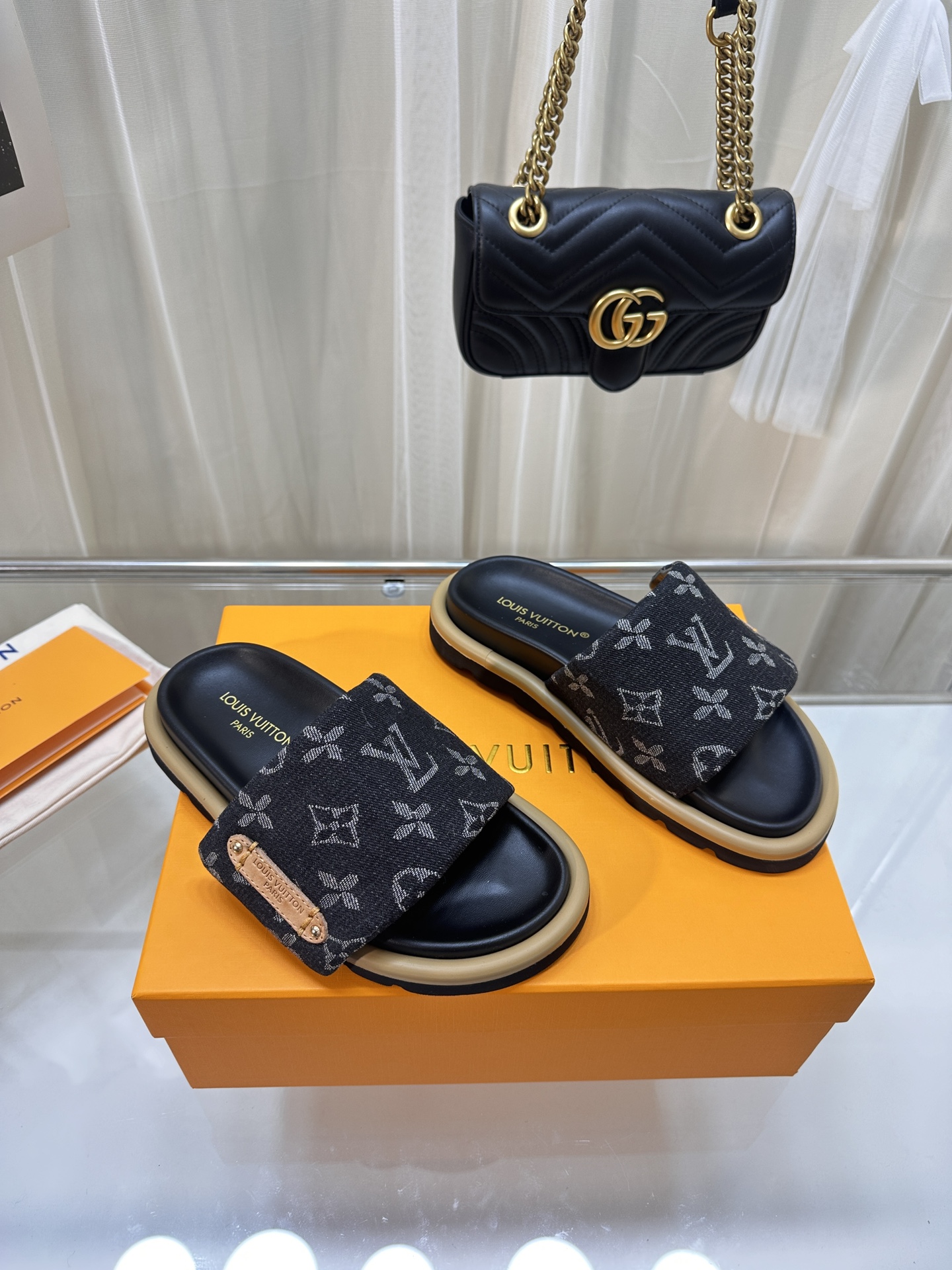 LOUIS VUITTON SLIDES