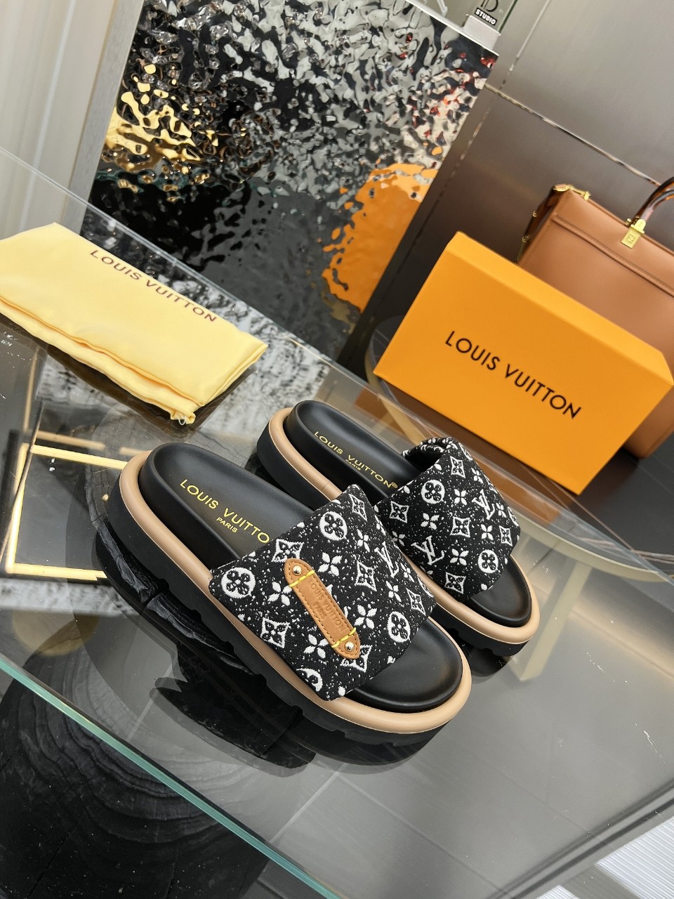 LOUIS VUITTON SLIDES