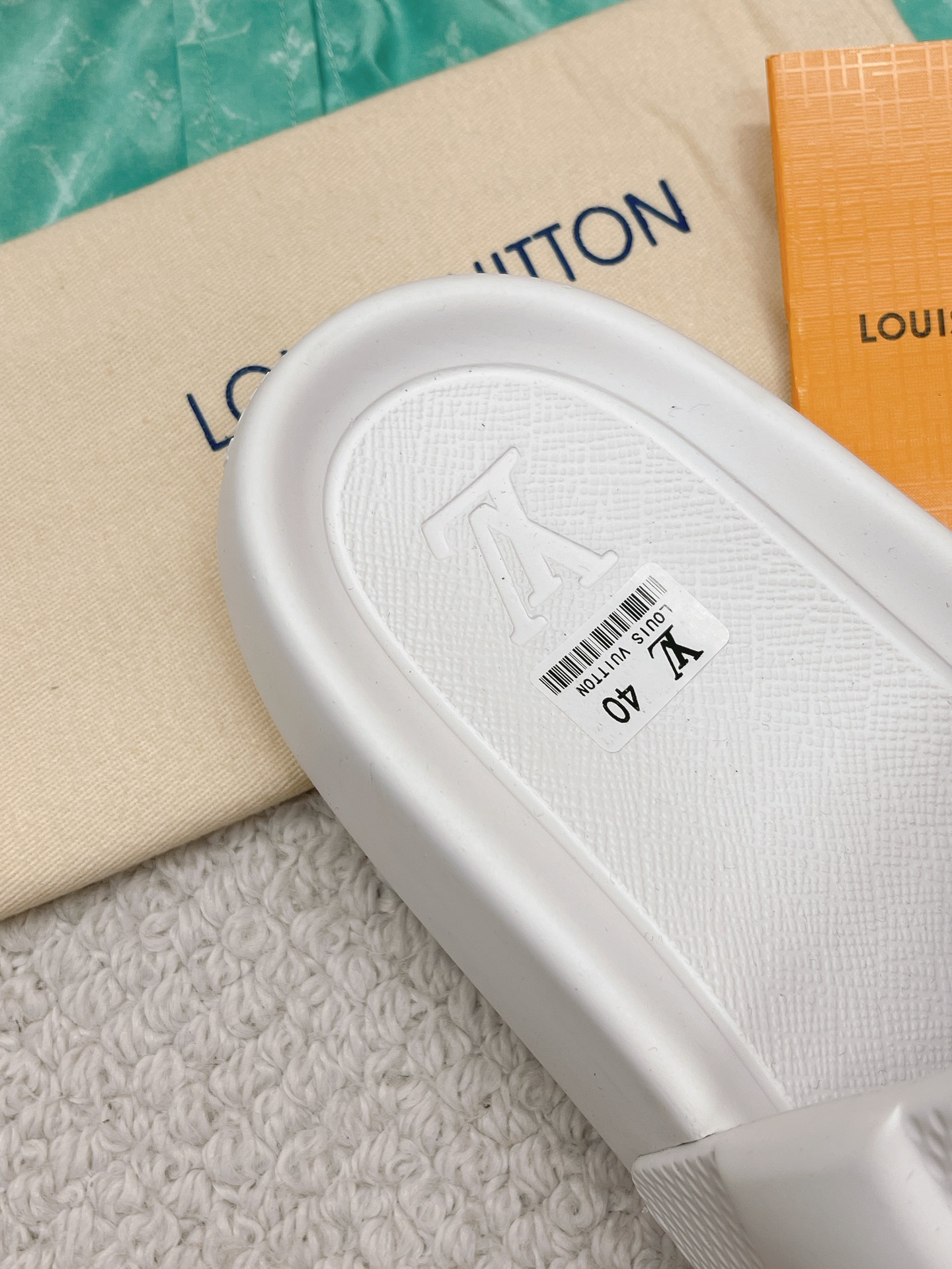 LOUIS VUITTON SLIDES