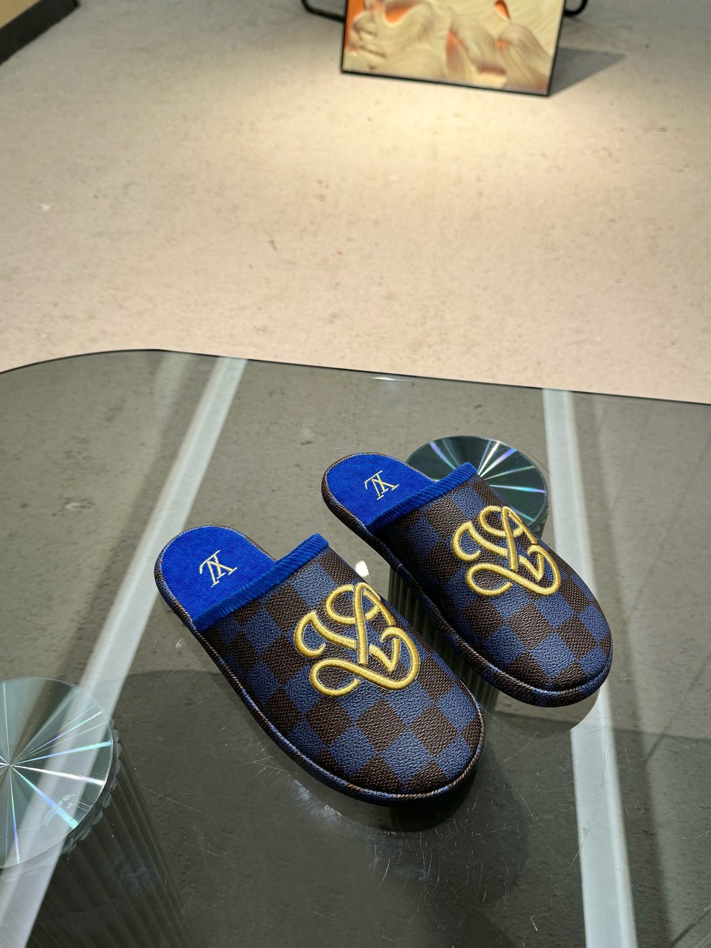 LV & loewe palace Hotel slippers