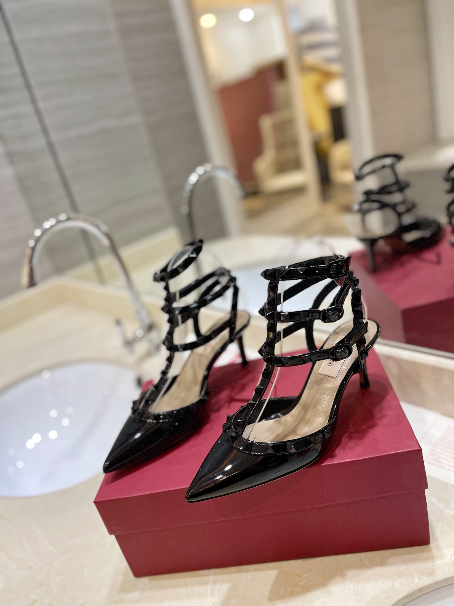 Valentino Rivet tied high heels