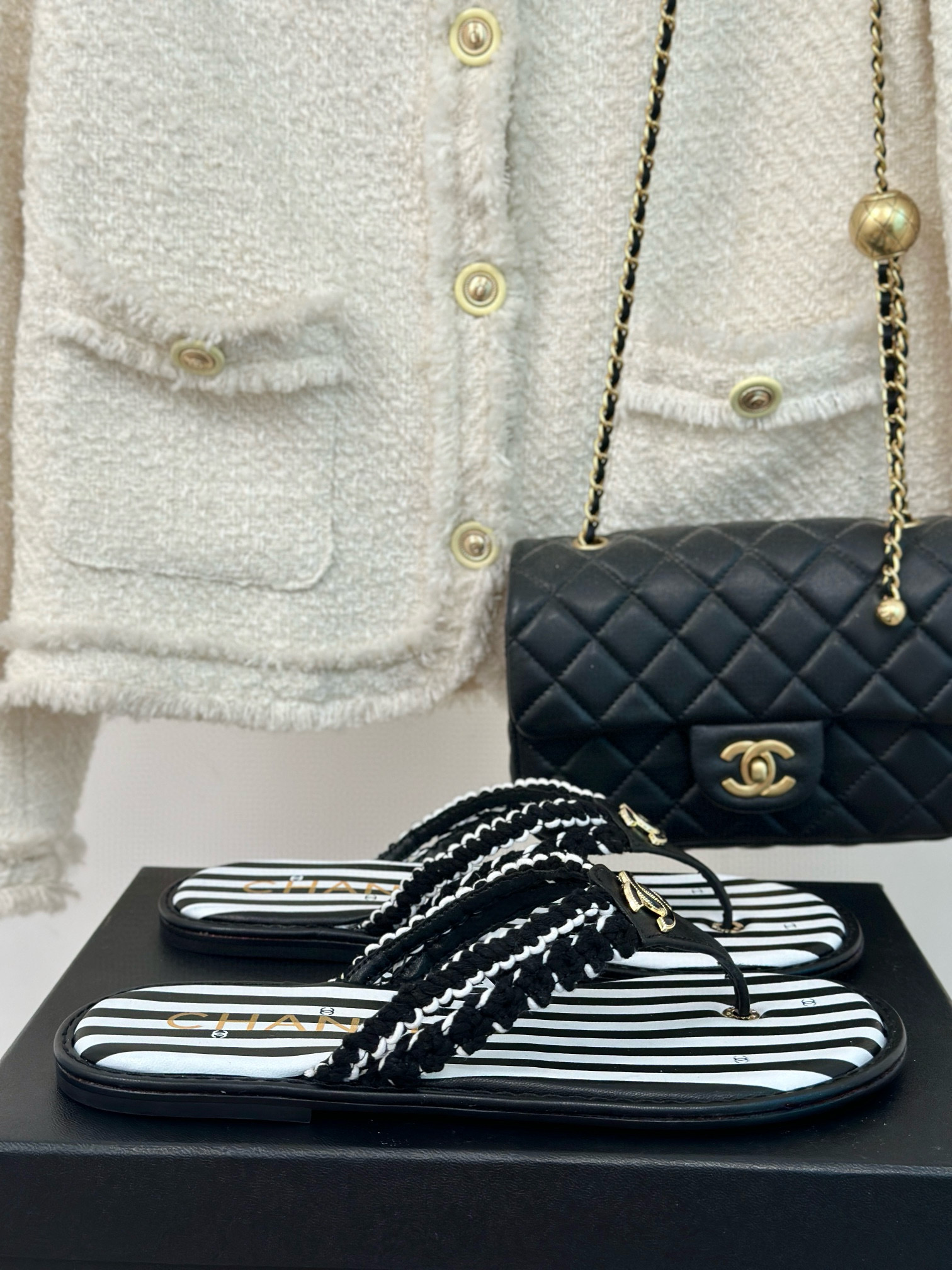 CHANEL Striped flip-flops