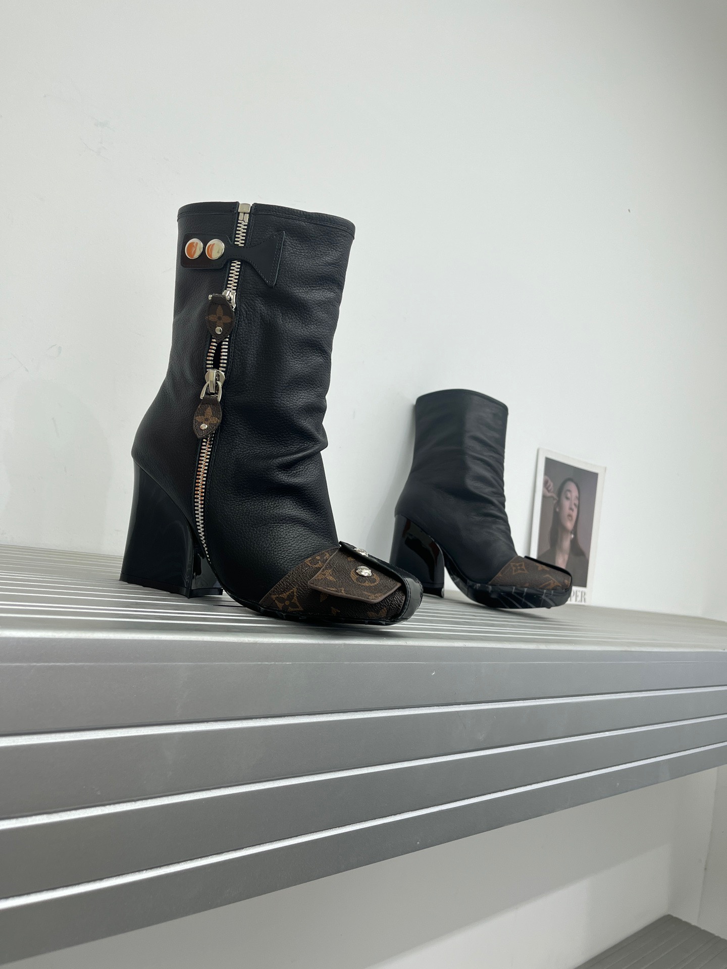 LV Metal nailed back zipper ankle boots