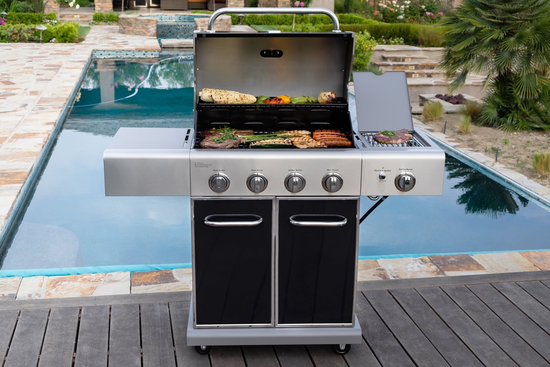 4-Burner Outdoor Propane Gas Grill with Searing Side Burner, Stainless Steel with Black Trim
